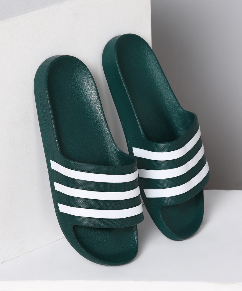 green adidas sliders