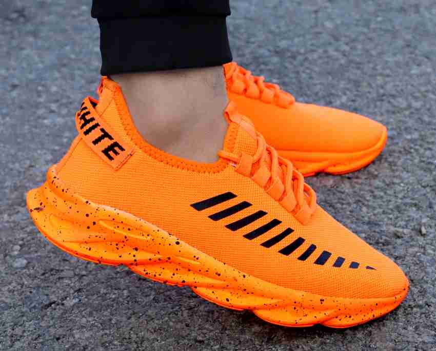 Orange sports shoes clearance