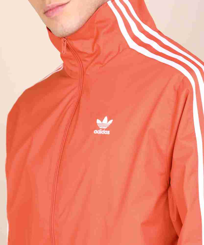 Orange adidas windbreaker store
