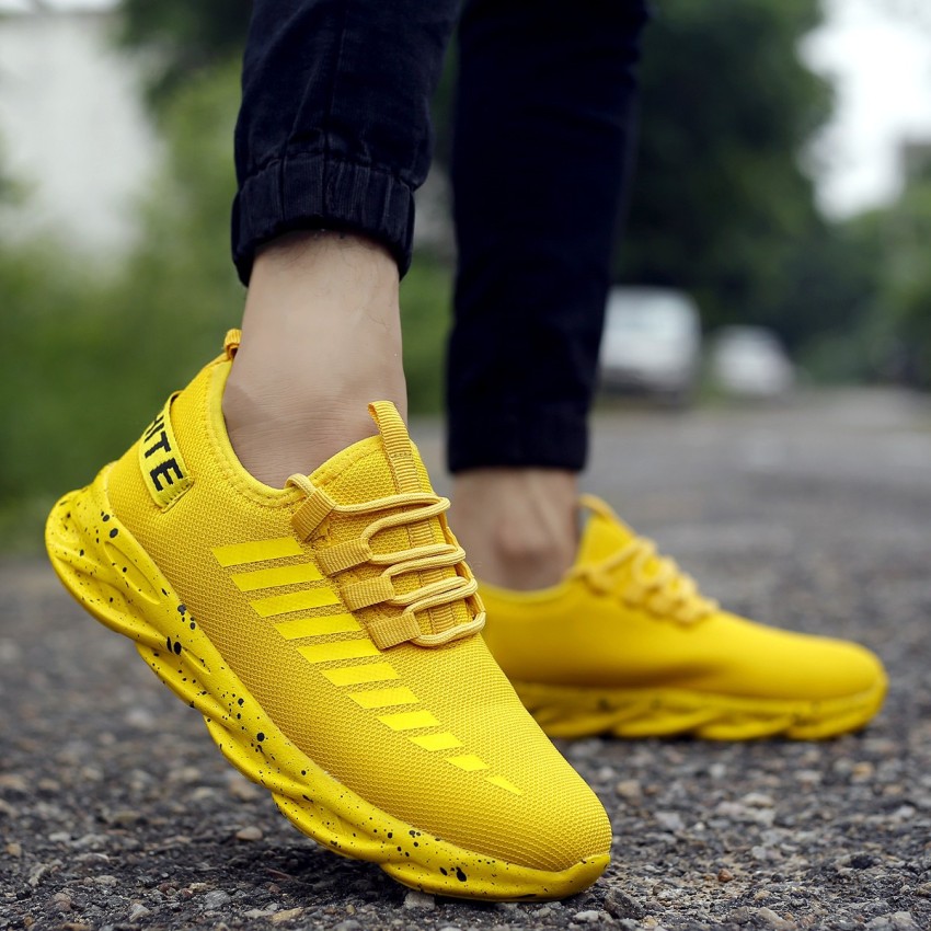 Yellow colour sale sports shoes