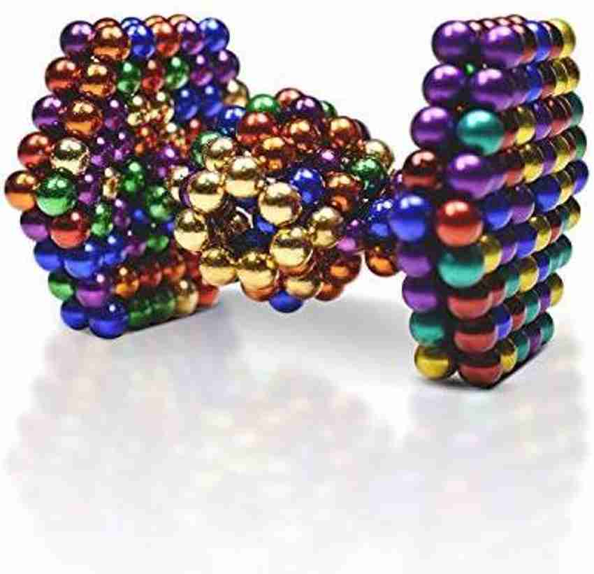 Satisfying magnetic balls top