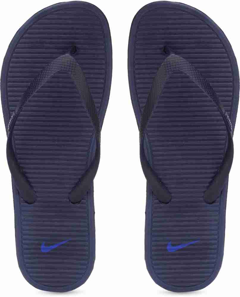 Nike navy flip flops hot sale