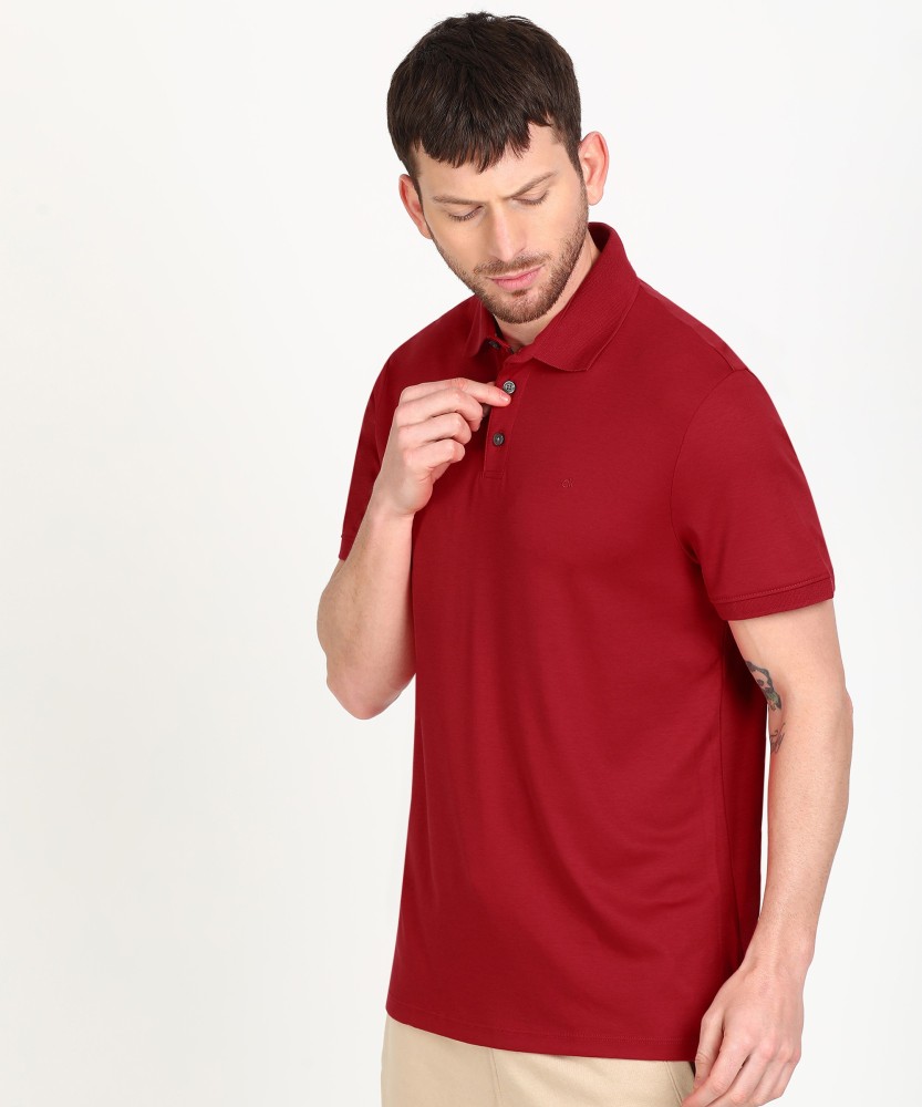 Calvin Klein Solid Men Polo Neck Maroon T-Shirt - Buy Calvin Klein Solid  Men Polo Neck Maroon T-Shirt Online at Best Prices in India