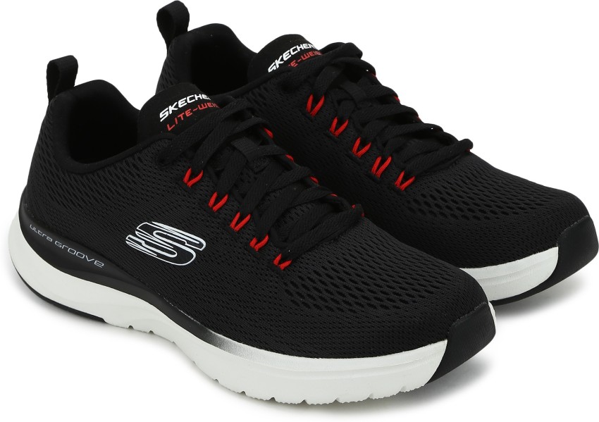 Skechers black outlet ultra groove trainers