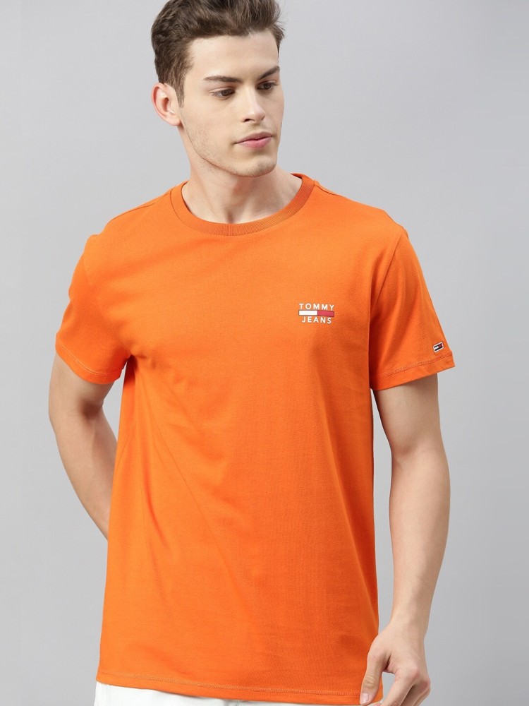 TOMMY HILFIGER Solid Men Round Neck Orange T Shirt Buy TOMMY