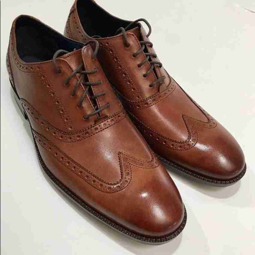 Cole haan wayne wingtip hot sale