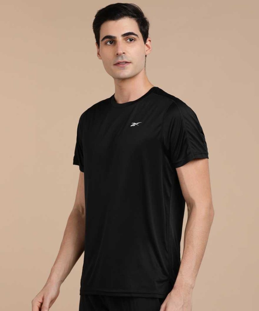 REEBOK Solid Women Round Neck Black T Shirt Buy REEBOK Solid