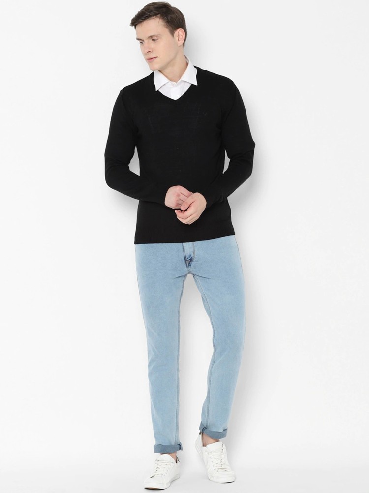 Black sweater outlet over white shirt