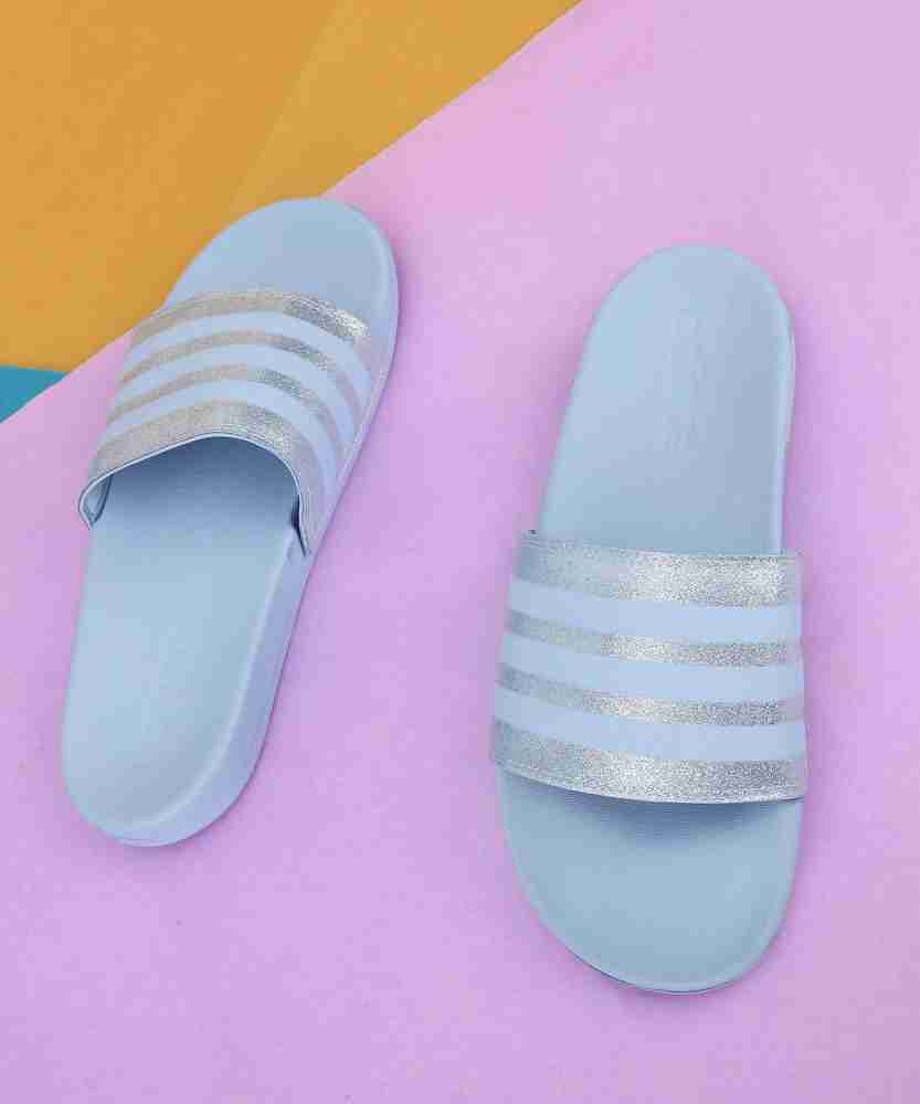 Glow blue adidas online slides