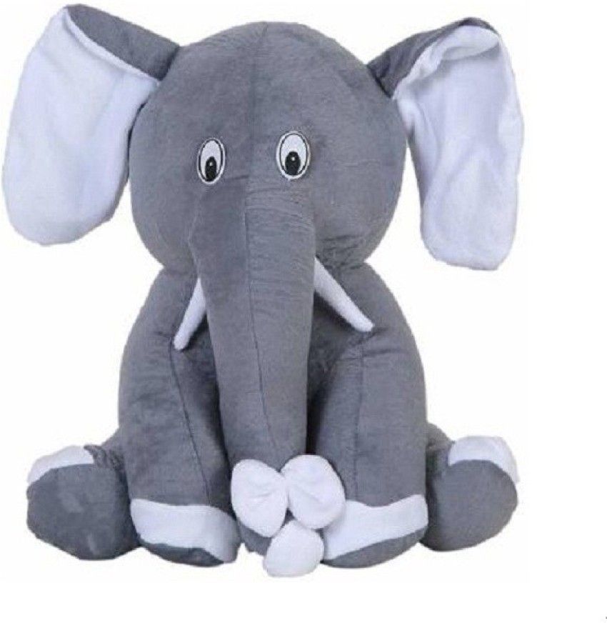 Small elephant deals teddy bear