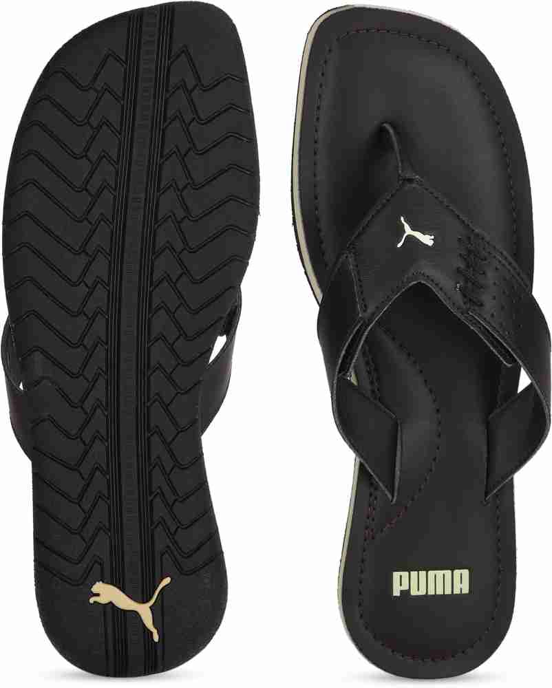 Puma brown flip store flops