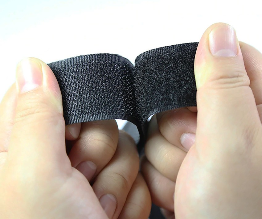Premium Photo  Velcro tape in a roll closeup on a white wall