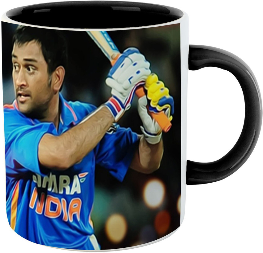 MS Dhoni gifts selfautographed bat to actor Yogi Babu