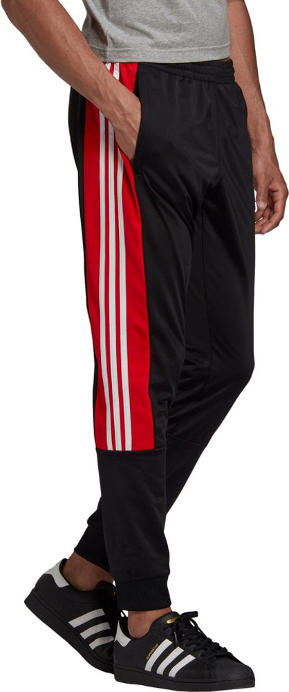 adidas red and black track pants