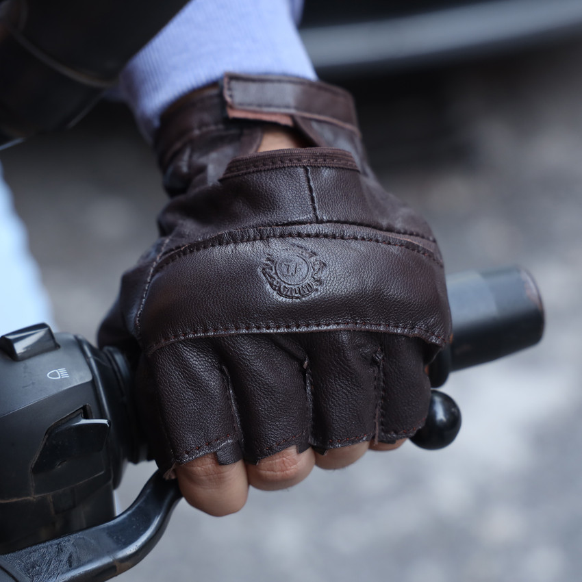 Leather hand gloves for bike top