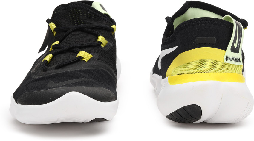 Nike free run store yellow and black