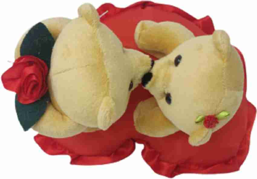 Universal kiss teddy deals bear