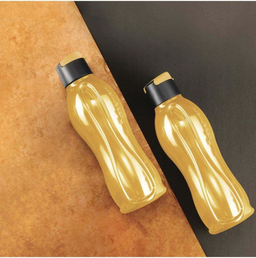 https://rukminim2.flixcart.com/image/850/1000/kk8mcnk0/bottle/j/4/h/750-tupperware-flip-top-golden-bottle-2-161594-s-m-mart-original-imafzmudgpfxrzhh.jpeg?q=90