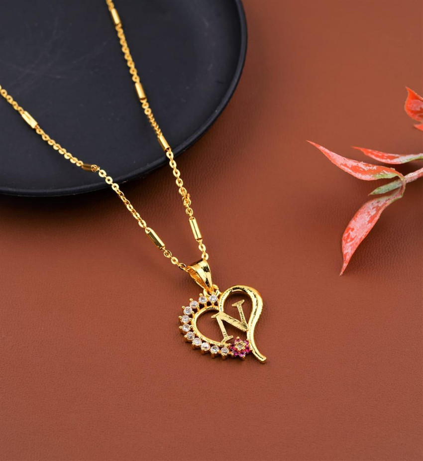 Navya top name locket