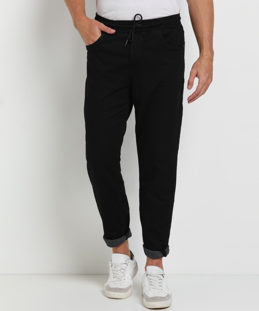 Buy CALVIN KLEIN JEANS Black Solid Cotton Regular Fit Mens Track Pants   Shoppers Stop