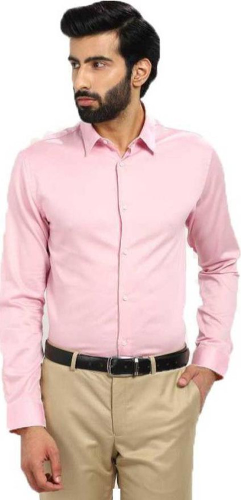Pink shirt tan pants on sale