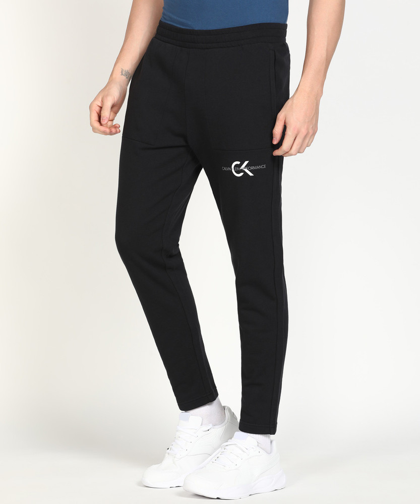 Calvin Klein Solid Men Black Track Pants - Buy Calvin Klein Solid Men Black Track  Pants Online at Best Prices in India | Flipkart.com