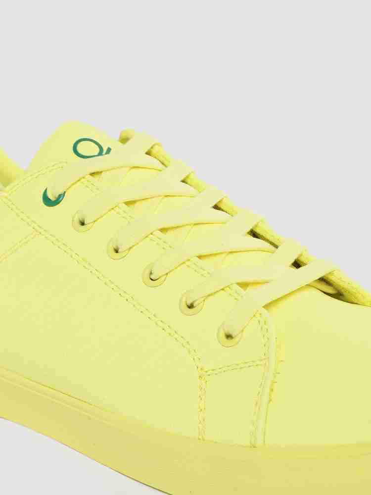 Ucb yellow sneakers sales