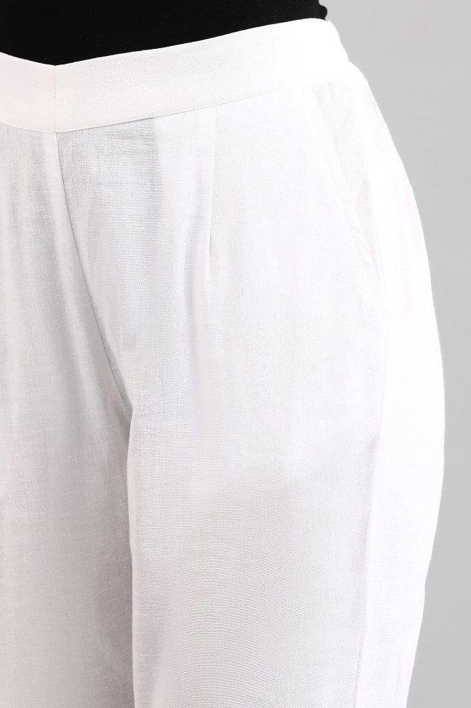 Buy Off-white Solid Trousers Online - Aurelia