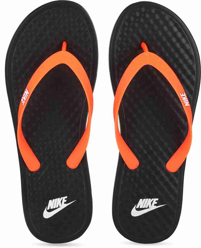 Nike slippers shop black and orange