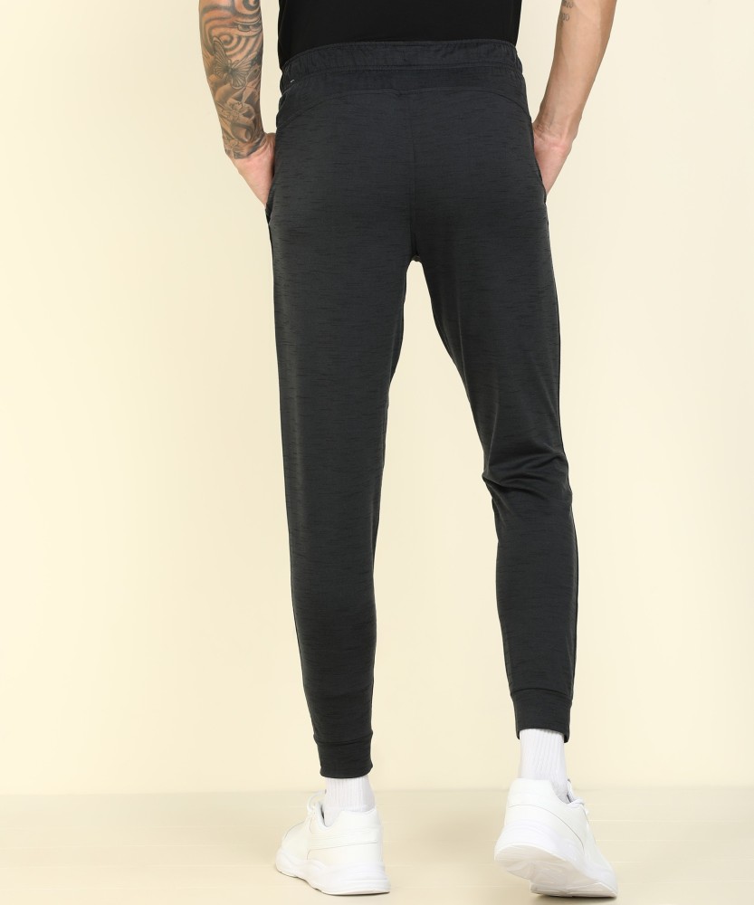 NIKE Yoga Dri-FIT Self Design Men Black Track Pants - Buy NIKE Yoga Dri-FIT  Self Design Men Black Track Pants Online at Best Prices in India