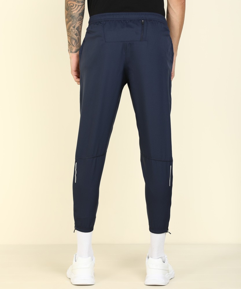 NIKE Solid Men Blue Track Pants