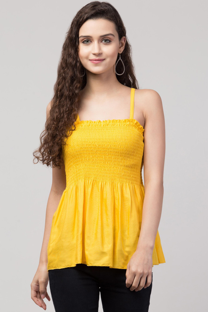 yellow sleeveless top