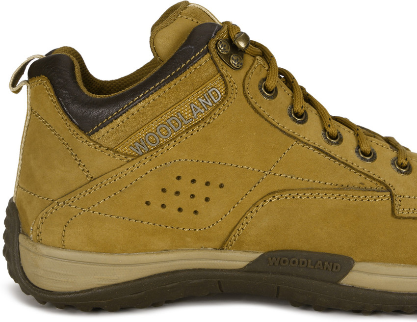 Woodland safety hot sale shoes flipkart