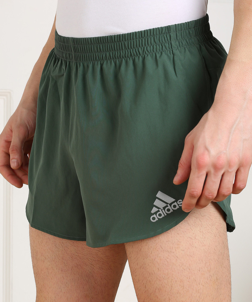 Green adidas shorts mens hotsell