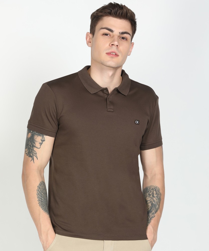 Calvin Klein Jeans Solid Men Polo Neck Brown T-Shirt - Calvin Klein Jeans Solid Men Polo Neck Brown T-Shirt Online at Best Prices in India | Flipkart.com