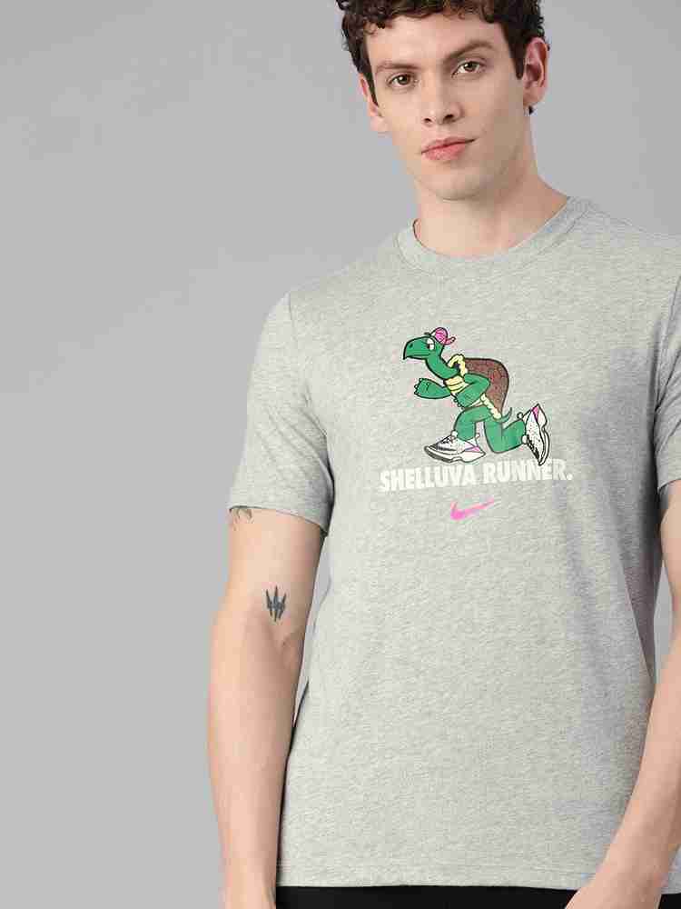 Nike dinosaur shirt store