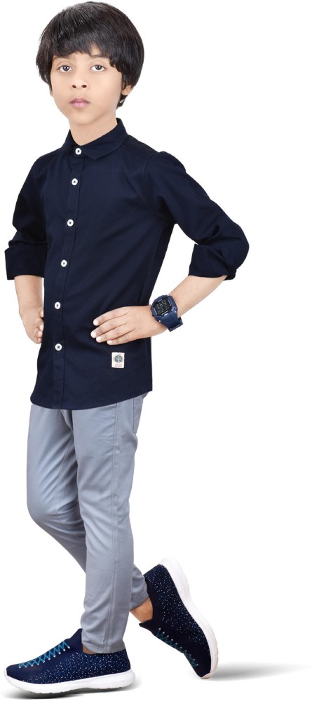 Male model wearing a navy blue shirt with white braces silver trousers and  spatz Stock Photo  Alamy