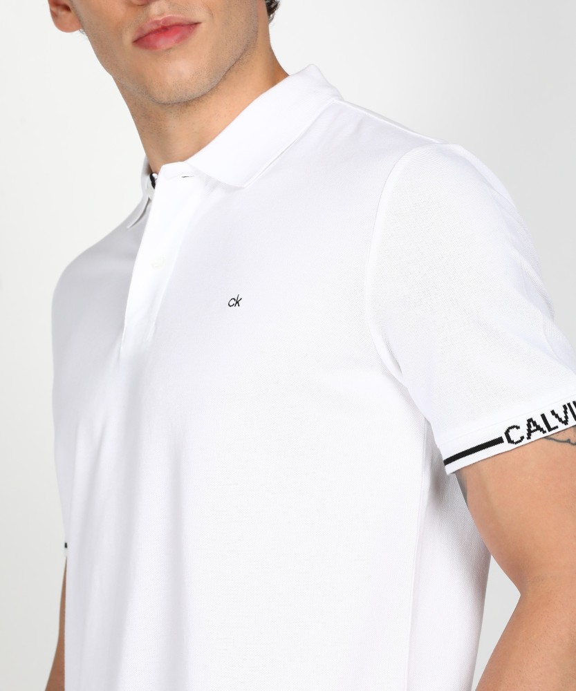 Calvin Klein Jeans Solid Men Polo Neck White T-Shirt - Buy Calvin