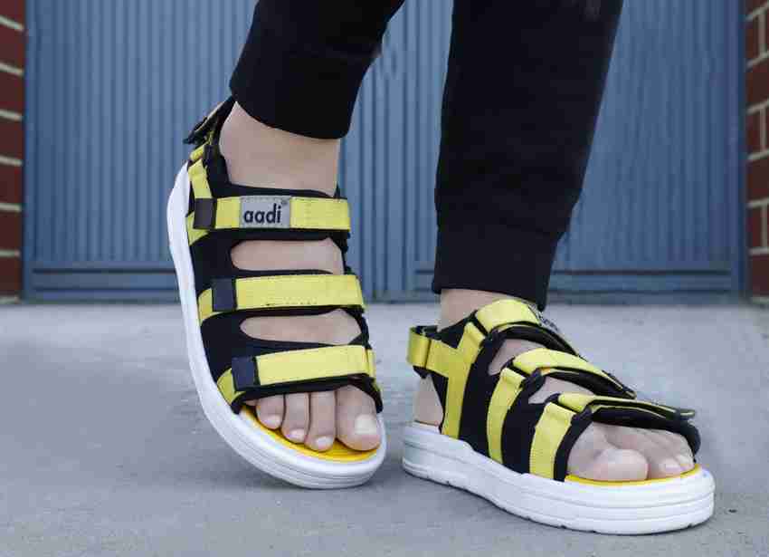 aadi Men Yellow Black Sandals Buy aadi Men Yellow Black