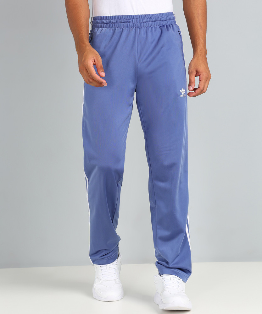 Light blue adidas track pants shop