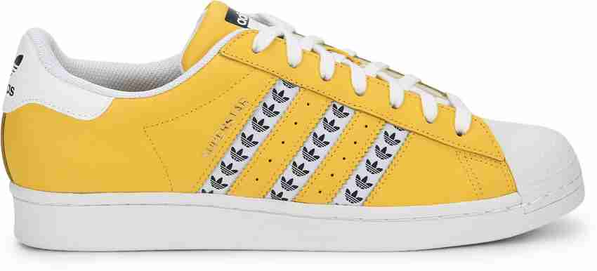 Adidas superstar slip shop on yellow