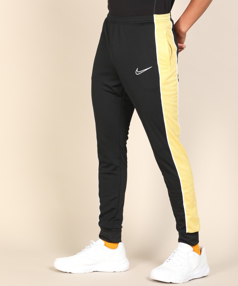 Nike track shop pants yellow