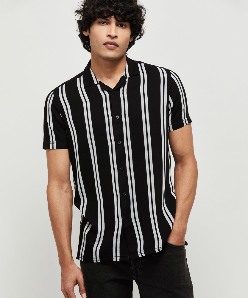 black shirt with white stripes on sleeves