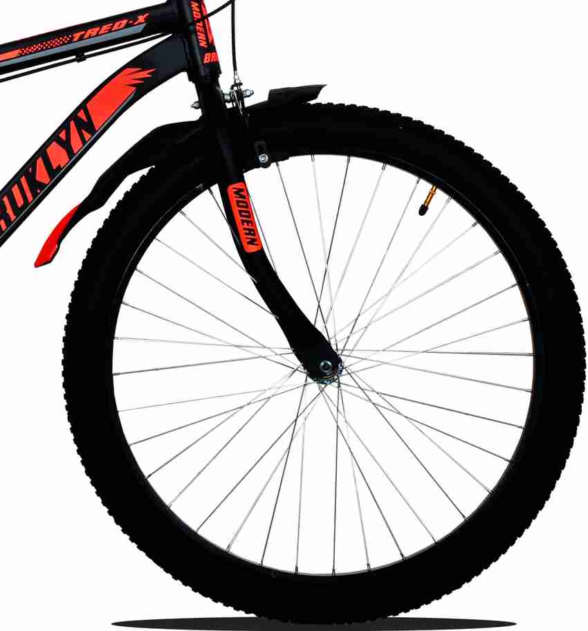 Black and orange trek bike top
