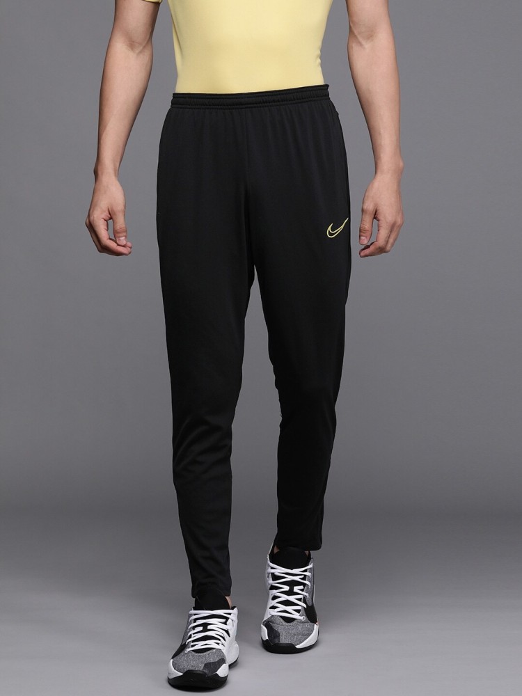 Nike joggers black with 2025 white stripe