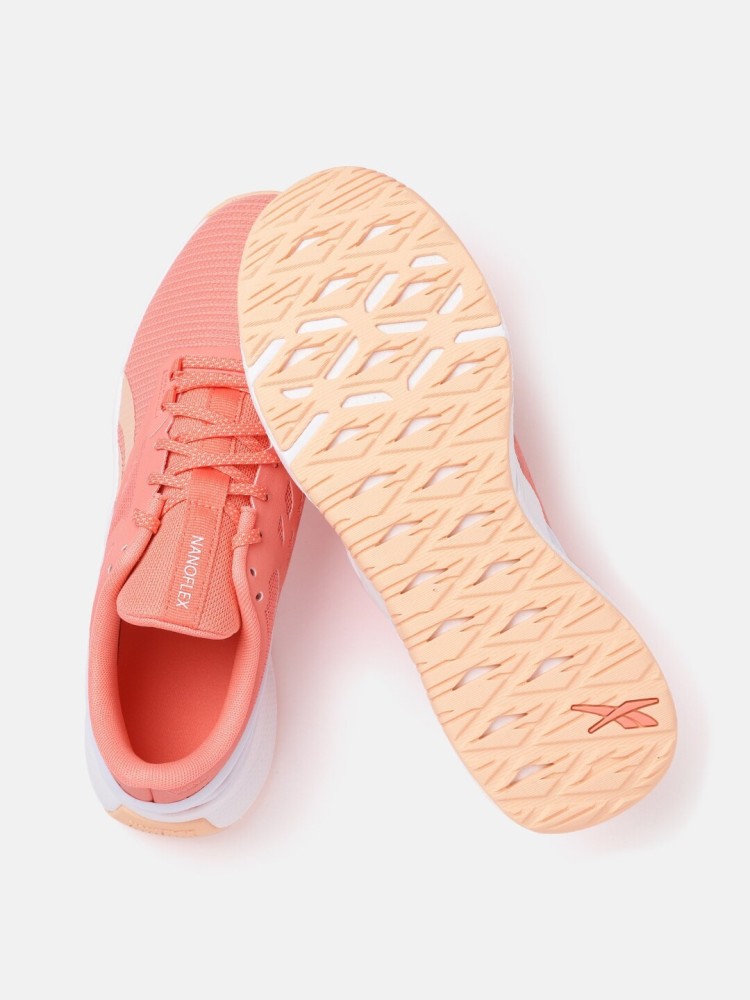 Peach reebok on sale