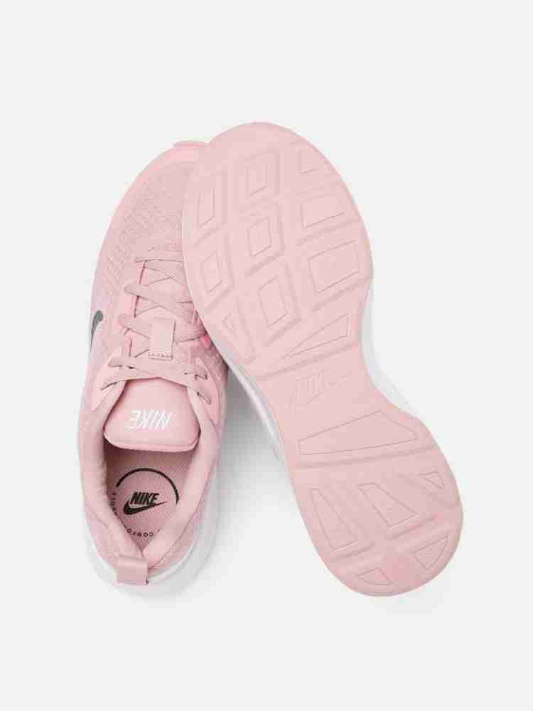 Pale pink outlet nike sneakers