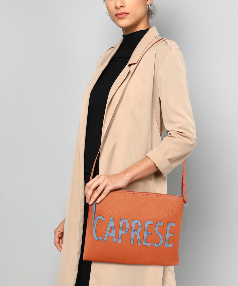 Caprese Orange Sling Bag Florentine Sling Medium Orange Orange Price in India Flipkart