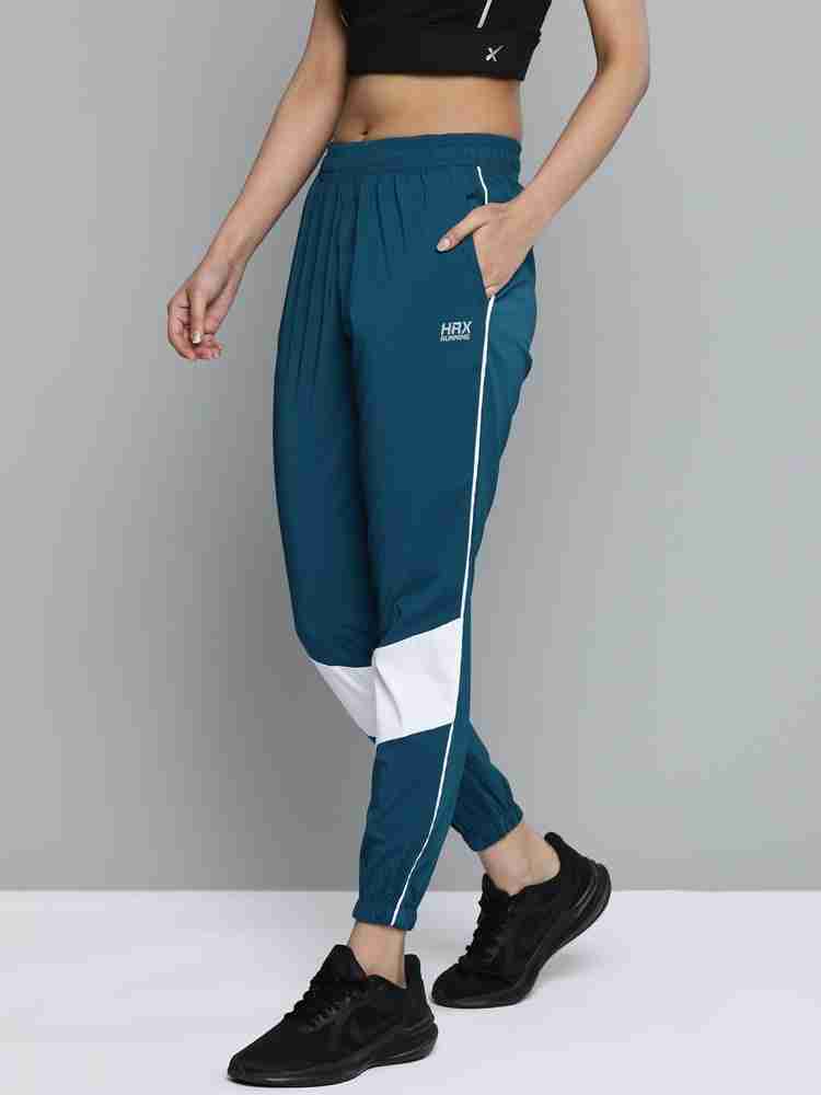 Nike heritage track pants womens sales