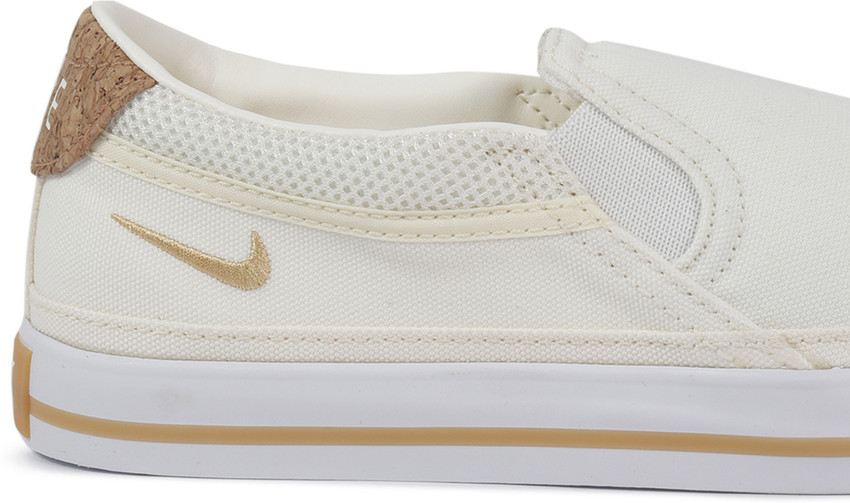 White slip on top nikes